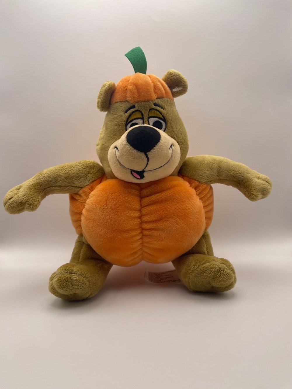 Yogi Bear dressed as a pumpkin plush